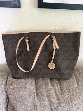 Michael Kors Brown Signature Tote with Beige Trim and Gold Charm
